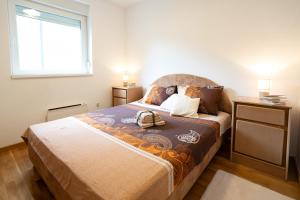 Cama o camas de una habitación en CVETIĆ apartman