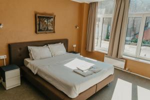 Postel nebo postele na pokoji v ubytování Hotel Cavalier