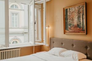 Postel nebo postele na pokoji v ubytování Hotel Cavalier