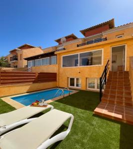 an image of a house with a swimming pool at Ventura Beach by Best Holidays Fuerteventura in Corralejo
