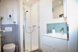 Koupelna v ubytování Grömitz- Center I App 321 inkl WLAN "3-2-1-Meins!" + 11 fotografií
