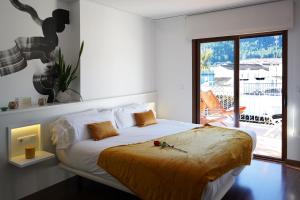 Postel nebo postele na pokoji v ubytování Mardenit Hotel Boutique + 37 fotografií