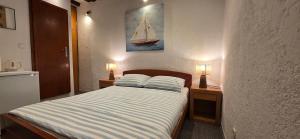 Postel nebo postele na pokoji v ubytování RD Apartments Center Zadar