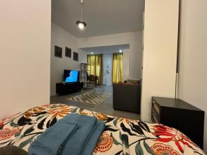 Ένα ή περισσότερα κρεβάτια σε δωμάτιο στο Le Salon Doré Apartment