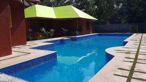 Bazén v ubytování Sree Resorts and Villas nebo v jeho okolí