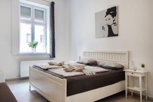 Posteľ alebo postele v izbe v ubytovaní Dora apartment near Buda Castle with PARKING!