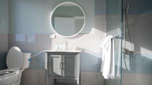 Ein Badezimmer in der Unterkunft GolfView Hotel