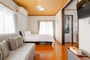 Voodi või voodid majutusasutuse Nest Togari Onsen toas