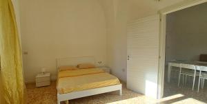 Ένα ή περισσότερα κρεβάτια σε δωμάτιο στο Casa Marì