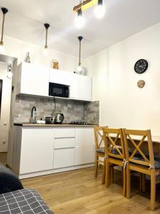 Kuchyň nebo kuchyňský kout v ubytování Navelu Didveli Residence