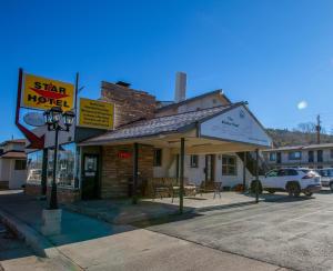 a star hotel sitting on the side of a street at Star Route 66 Grand Canyon in Williams