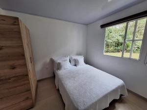 A bed or beds in a room at Hotel Diego Pacho