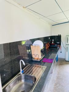 Kuchyň nebo kuchyňský kout v ubytování Villa Hideout