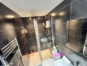 Koupelna v ubytování Quarto 5 casa compartilhada no L6