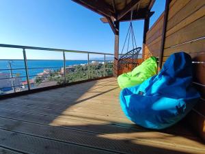 a balcony with a view of the ocean at Carefree Apartments in Ulcinj
