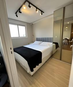 Voodi või voodid majutusasutuse Apartamento com 2 quartos com ar em Moema toas