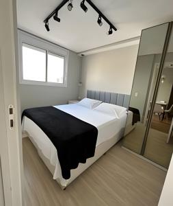 Voodi või voodid majutusasutuse Apartamento com 2 quartos com ar em Moema toas
