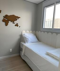 Voodi või voodid majutusasutuse Apartamento com 2 quartos com ar em Moema toas
