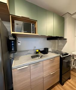 Köök või kööginurk majutusasutuses Apartamento com 2 quartos com ar em Moema
