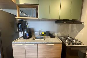 Köök või kööginurk majutusasutuses Apartamento com 2 quartos com ar em Moema