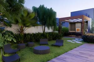 Aed väljaspool majutusasutust Apartamento com 2 quartos com ar em Moema