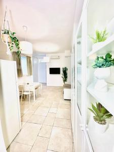 TV a/nebo společenská místnost v ubytování Paradise Rooms
