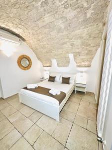 Postel nebo postele na pokoji v ubytování Paradise Rooms
