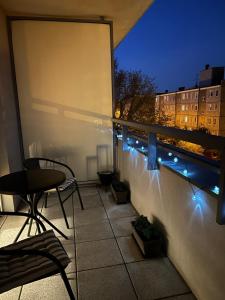 Balkón alebo terasa v ubytovaní Przytulny apartament na Brzasku