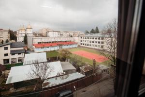 a view of a tennis court in a city at Karla's House in Vaslui