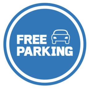 a free parking sign with a car in a circle at Beautiful apartment in the city center, Angel City in Kraków