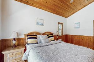 Postel nebo postele na pokoji v ubytování Fawn Lodge