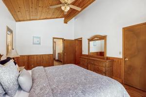 Postel nebo postele na pokoji v ubytování Fawn Lodge