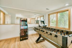 a kitchen with a gas stove in a room at Koselig Cottage on Medicine Lake in Minneapolis