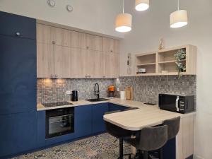 Køkken eller tekøkken på Apartament Marynarska