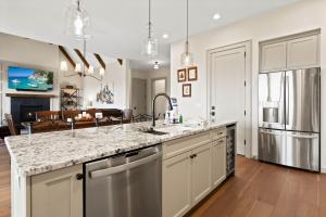 a kitchen with a sink and a counter top at Happy Campers in Boone