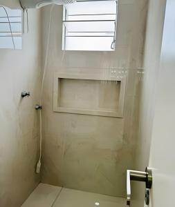 Et badeværelse på Condomínio Mundi Resort