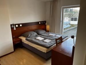 Postel nebo postele na pokoji v ubytování Hotel Tenova Köln-Neumarkt + 37 fotografií