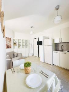 Kuchyň nebo kuchyňský kout v ubytování Paradise Rooms