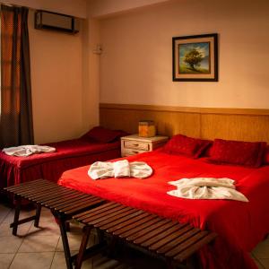 En eller flere senge i et værelse på CasaBlanca Hotel Boutique