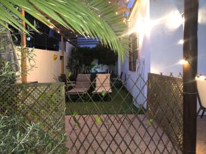 a view of a house with a fence at Villa Tranquilla in Estepona