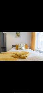 Letto o letti in una camera di Warwick Studio Spaces