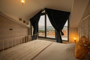 Postel nebo postele na pokoji v ubytování Deniz Loft Fethiye