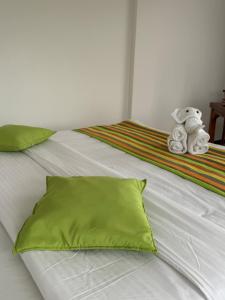 Postel nebo postele na pokoji v ubytování Karisa Nature Villa
