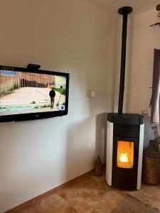 TV a/nebo společenská místnost v ubytování La casa di Giulia