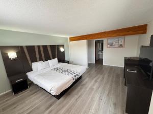 Letto o letti in una camera di Hotel 191 - Moab