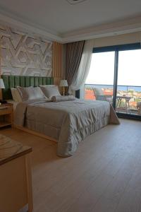Postel nebo postele na pokoji v ubytování Datca Suites Luxury Boutuiqe Hotel