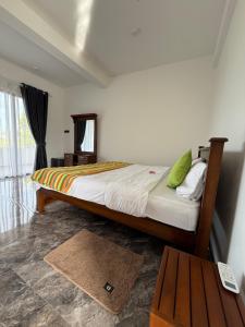 Postel nebo postele na pokoji v ubytování Karisa Nature Villa