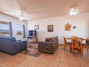 a living room with a couch and chairs and a table at Casa Tilly El Dorado Ranch San Felipe Rental Home in Playa El Paraíso
