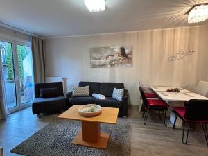 Ein Sitzbereich in der Unterkunft Exclusive Holiday Apartments