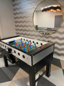 a pool table in front of a mirror at Market House in Newcastle in Newcastle upon Tyne